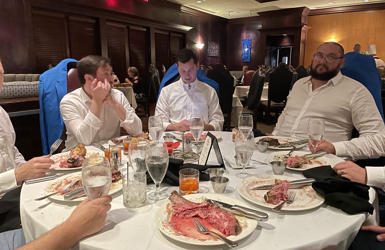 Diamond Jim Brady cuts at the table