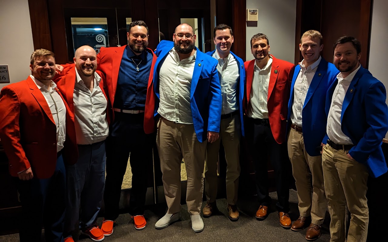 The full squad at Lawry's in red and blue blazers