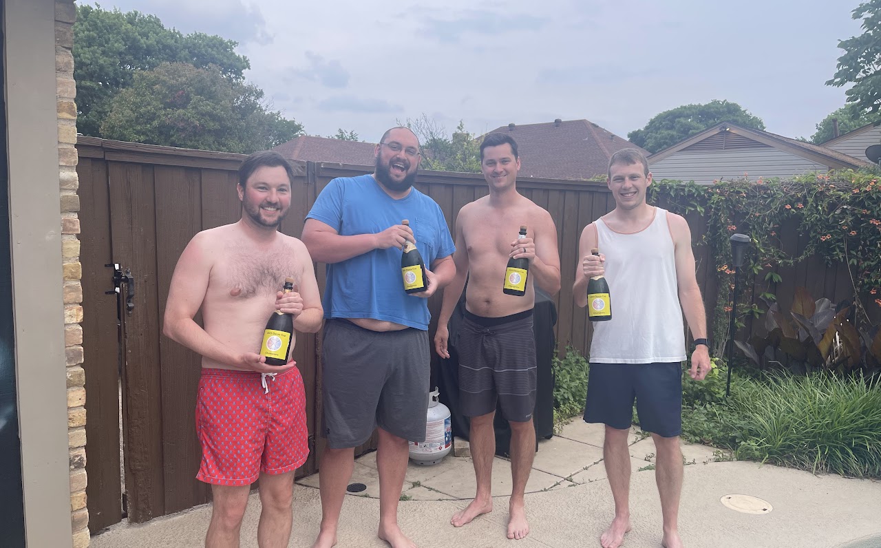 The 2023 Danza Cup Champions celebrating poolside