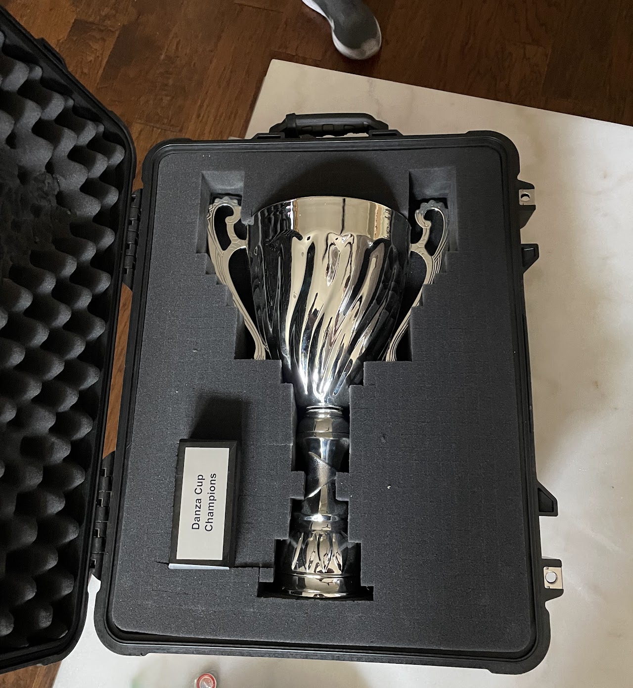 The Danza Cup trophy in its custom carrying case